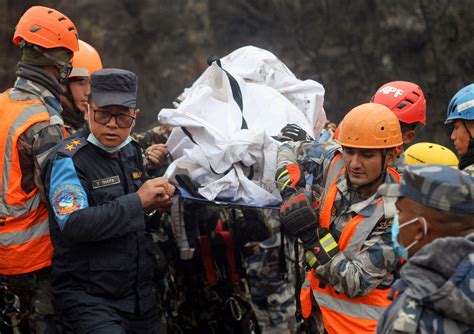 Nepal Plane Tragedy Hospitals Return Bodies Of Air Crash Victims To