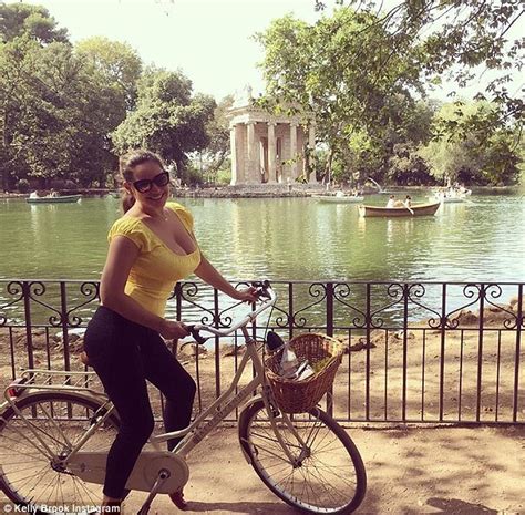 Kelly Brook Shows Off Her Assets In Yellow Top Cycling Through Rome With Jeremy Parisi Daily