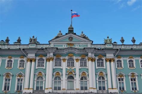 Sunny Day In Saint Petersburg Russian Flag Flying Above Facade Of