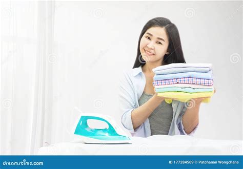 Happy Young Beautiful Asian Woman Housewife Ironing Clothes Iron In
