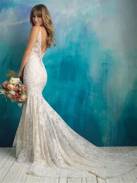 Softly Unfurling Embroidered Appliques Scallop The Bodice And Illusion Back Of This Sleeveless