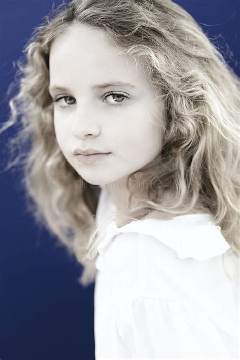 Emotional Portrait Of Young Beautiful Girl With Curly Hair Female