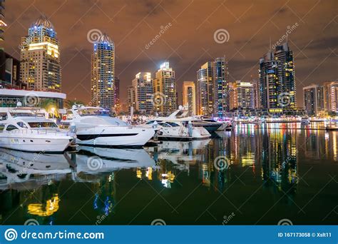 Dubai Marina At Night With Light Reflection On The Water