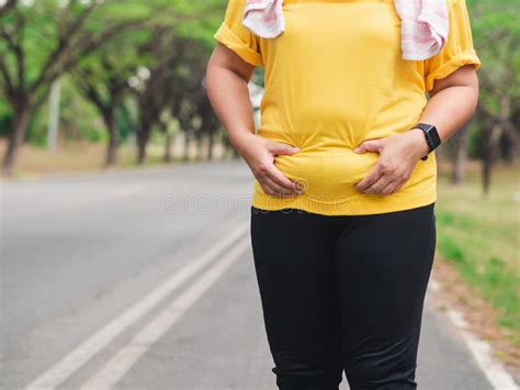 Overweight Woman Holding Her Belly Weight Loss Concept Stock Image