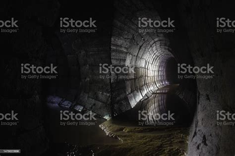 Old Underground Cave Tunnel Filled With Water Stock Photo Download