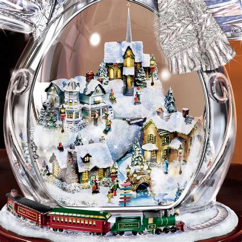 The Thomas Kinkade Illuminated Crystal Snowman Hammacher Schlemmer