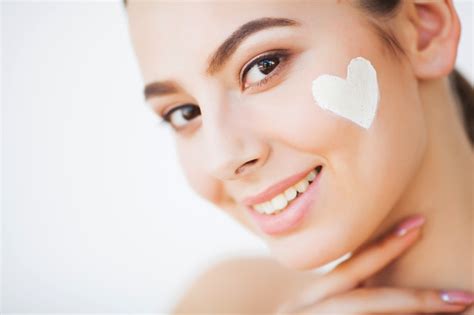 Skin Care Beautiful Model Applying Cosmetic Cream