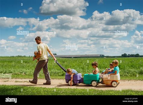 Child Wagon Pulling Hi Res Stock Photography And Images Alamy