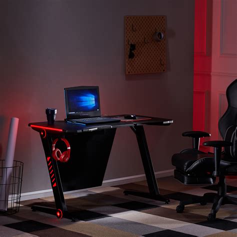 The bottom rack can be rotated 180 degrees to the side. Merax Ergonomic Gaming Desk With RGB LED Lights and Headphone Hook, Black - Walmart.com ...