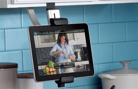 When not in use, it would be flip or folded upward for a clean look. belkin-kitchen-cabinet-tablet-mount-1 - Decoist