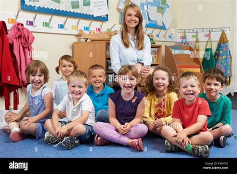 Children With Teacher In Classroom Hi Res Stock Photography And Images