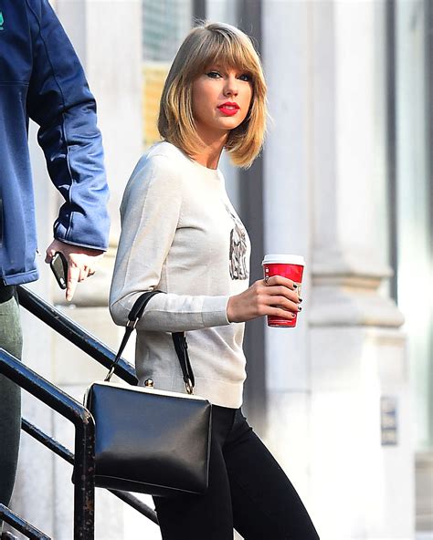 With her trademark red pout, blond. Taylor Swift in Black Tight Jeans -02 | GotCeleb