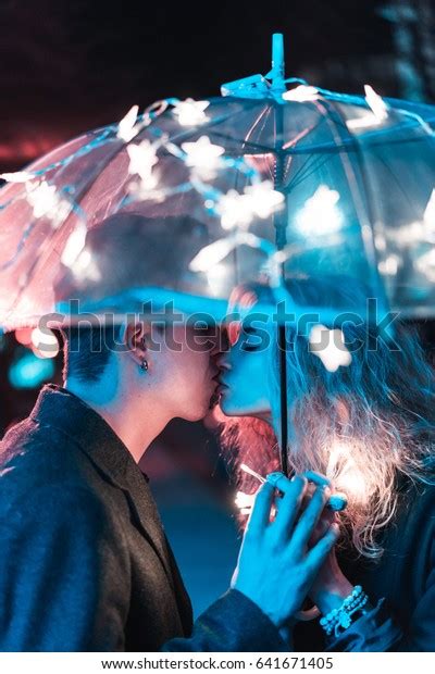 Guy Girl Kissing Under Umbrella On Stock Photo 641671405 Shutterstock