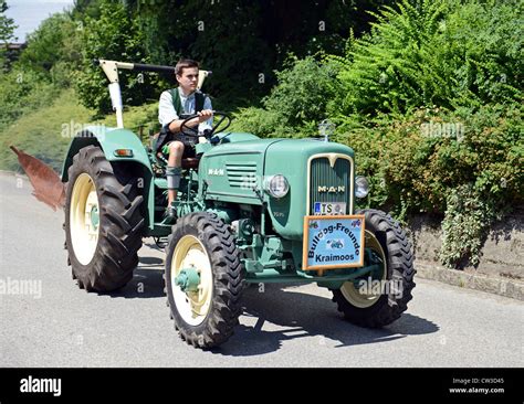 Historical Tractor Man Stock Photos And Historical Tractor Man Stock