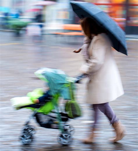 Mother Walks With The Child In The Stroller Stock Image Image Of