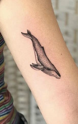 A whale tattoo channels the majestic beauty of marine life and the even temperament of an amazing sea creature. Tiny Humpback Whale Tattoo - TattManiaTattMania