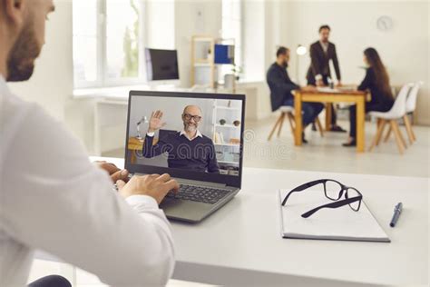 Man Having Online Video Meeting With Senior Boss Or Company Client Or