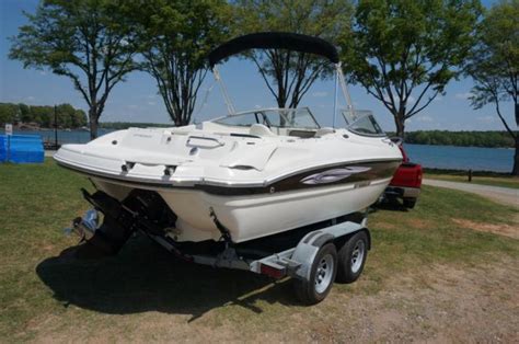 Black and white interior and exterior with tan features in cuddy. 2011 Stingray 225CR Cuddy Boat for sale in Mooresville ...