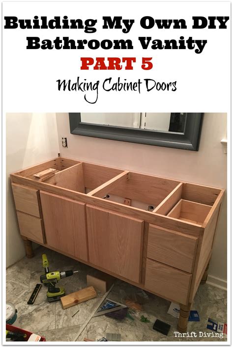 The bathroom vanity cabinet is dark wood topped with pale quartz tile and a striped backsplash made of subway tile. Building a DIY Bathroom Vanity: Part 5 - Making Cabinet Doors