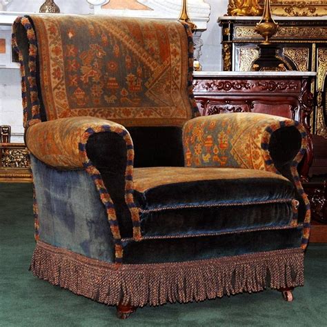 Two very rare antler parlor chairs made of stag antlers with feet carved as lion's claws. Side view of the Astor's comfy chairs. | Victorian parlor