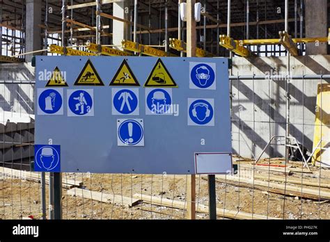 Standard Warning Signs On Building Stock Photo Alamy