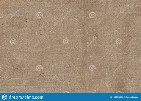 Old Grungy Canvas Pattern With Dirty Spots In Brown Color Stock Photo