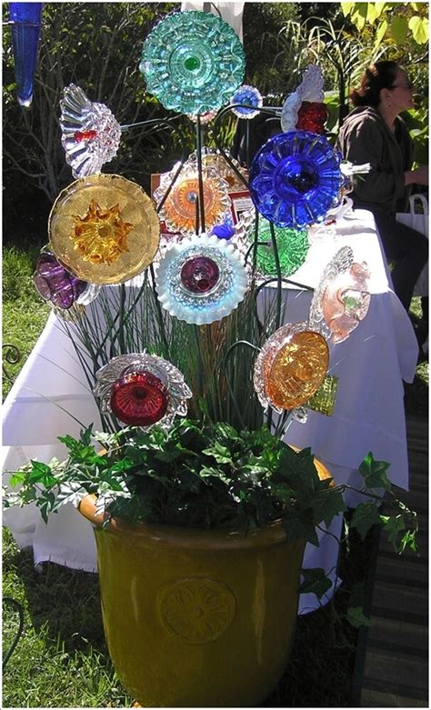 How to make glass garden flowers made from recycled glass dishes and plates. 10 Wonderful Garden Accents Created from Recycled Materials