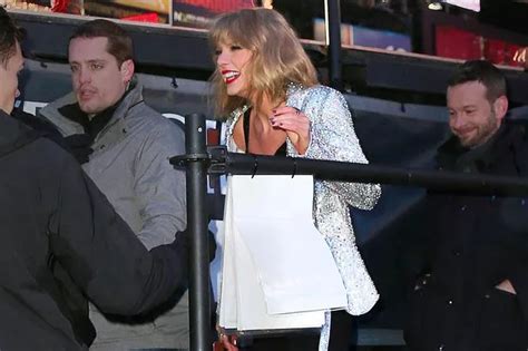 watch taylor swift suffer embarrassing fall after new year s eve show but recover like a true