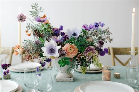Thrifty florist locations visit one of our 16 convenient locations! Modern centerpiece in purple with peach-orange tones by ...