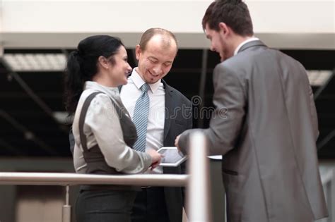 Employees Are Talking In The Lobby Of The Office Stock Image Image Of