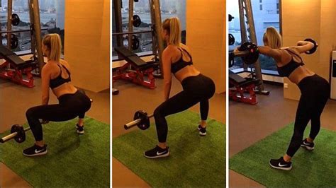 renae ayris shows off her toned physique whilst mounting pool toy pool toys physique ballet