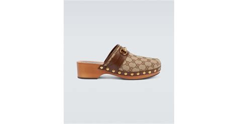 Gucci Canvas Gg Leather Trimmed Clogs For Men Lyst Canada