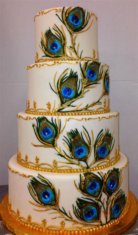 I wanted to decorate a cake with leaves but not just basic green leaves. Peacock feathers | Peacock wedding cake, Feather wedding ...