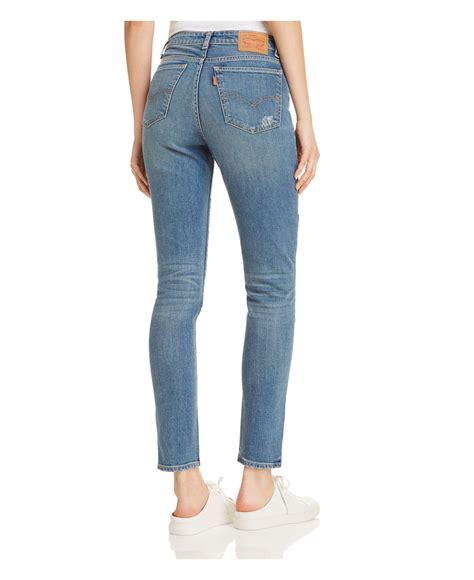 Slim through hip and thigh, skinny leg opening. Levi's Denim 721® Vintage High Rise Skinny In Courage Blue ...