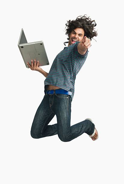 310 Man Jumping With Laptop Photos And Premium High Res Pictures