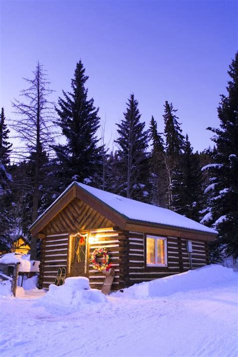 These Cozy Photos Of Log Cabins In The Snow Will Make You