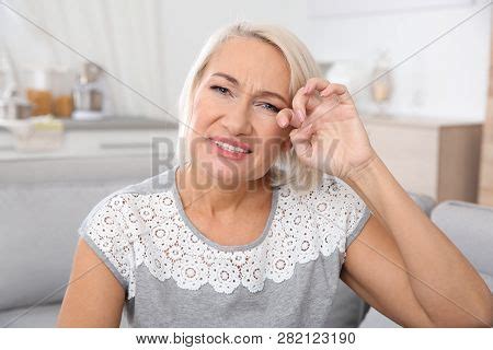 Mature Woman Rubbing Image Photo Free Trial Bigstock
