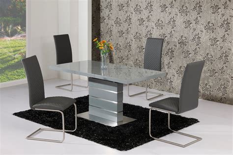 Wood furniture is perfect for all dining room pieces like tables, chairs, buffets and servers since wood is hefty and durable. Extending Grey High Gloss Dining Table and 4 Grey Chairs
