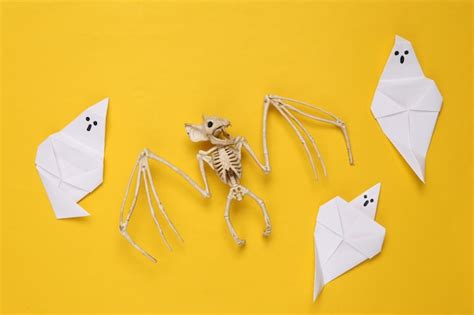 Premium Photo Creative Halloween Layout Vampire Bat Skeleton Origami
