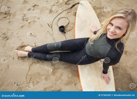 Overhead Portrait Of Blond In Wet Suit With Surfboard At Beach Stock Photo Image Of Copy