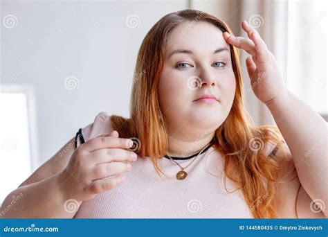 Nice Chubby Red Haired Woman Touching Her Face Stock Image Image Of Face Look 144580435