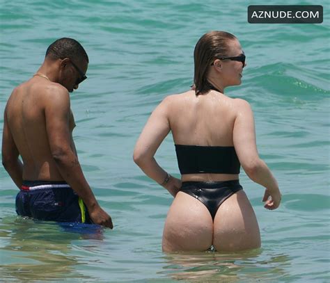 Bianca Elouise Sexy In A Black Bikini With Thong Bottoms At The Beach With Rapper Sunny In Miami