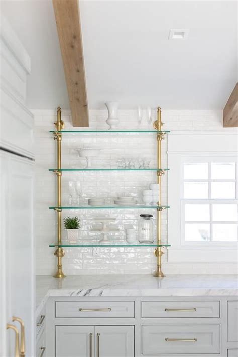French Brass Plumbing And Glass Kitchen Shelves Mounted On White Glazed