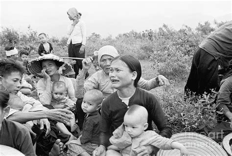 South Vietnamese Villagers Wait Photograph By Bettmann Fine Art America