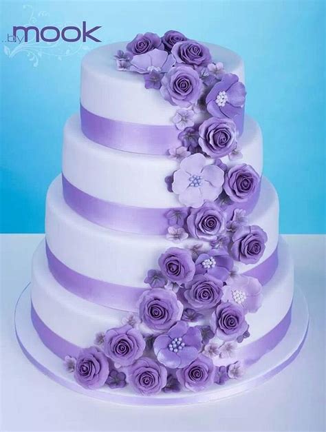 Purple Flowers Wedding Cake Decorated Cake By Annah Cakesdecor