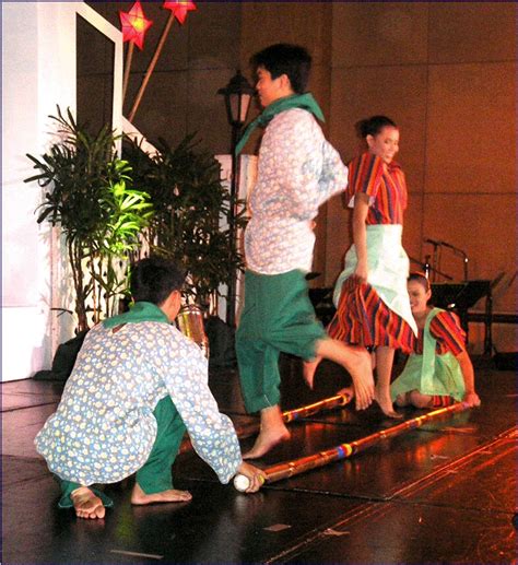 Learn How To Dance Tinikling Bamboo Dance Filipino Culture Teach