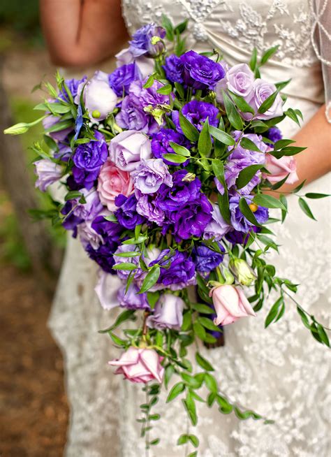 cascading bridal bouquet with purple and lavender lisianthus