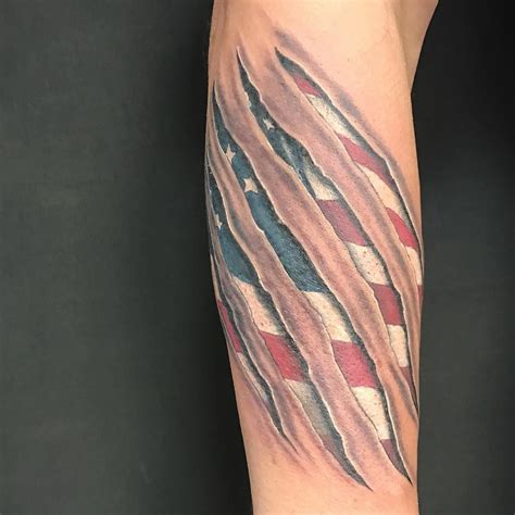 American Flag Tattoo Ripping From The Skin On The Arm American Flag