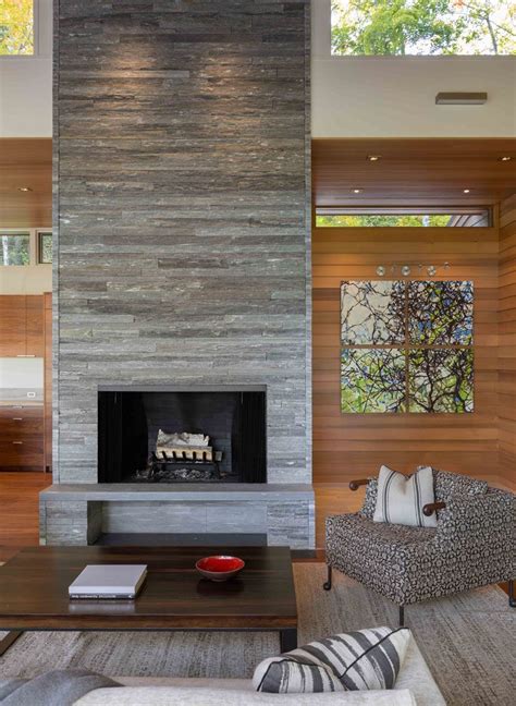 In This Modern Living Room Theres A Stacked Stone Fireplace And