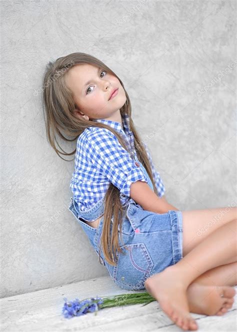 Portrait Of Little Girl Outdoors In Summer Stock Photo By ©zagorodnaya